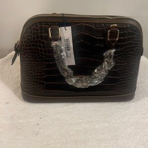 Brand new Dooney and Bourke purse mocha, dark brown